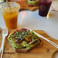 Delicious avocado toast and juice! at Toastique in Alexandria