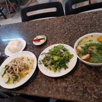 Steam buns, chicken fried rice, fish noodle soup.  at Ngoc Chi in Da Nang