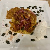 Cauliflower tenders on a bed of Boulgour served with leek/cabbage dip and an emulsion of candied lemon  at Les Bacchanales in Nancy