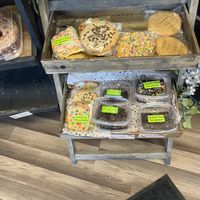 A vegan brownie is displayed on the bottom shelf  at Glaze in East Wenatchee
