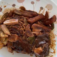 Black bean tteokbokki with all the added extras!  at Cow Tteokbokki  in Seoul