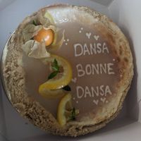 Small Lemon Cheesecake (50€) with three letters (8€). 
 at Sakura in Berlin