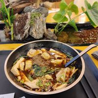 Fresh tofu, soy gluten, king oyster mushrooms, fresh ramen and hot and sour sauce at Tang Bar in San Francisco