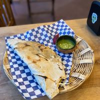 Picture doesn’t show scale, but a very large tlayuda de setas with a delicious dipping sauce  at Los Muchitos Comida Vegana in Oaxaca