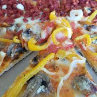 Pizzas veganas at Los Muchitos Comida Vegana in Oaxaca