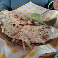 Tlayuda at Los Muchitos Comida Vegana in Oaxaca