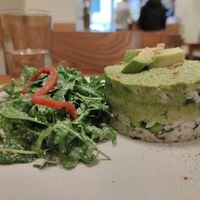 Rumi's Dream : avocado spin on a traditional Persian recipe, made of risotto, avocado, edamame, dill and pine nuts, topped with avocado vegan yoghurt sauce. It was just PERFECT.  at Avocado in Athens