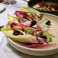 Almond feta and bitter leaves   at Mallow - Borough Market in South East London