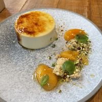 crème brûlée, anise apricots, pistachio biscuit crumbs  at Mallow - Borough Market in South East London
