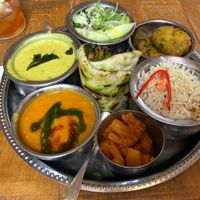 market thali: kiri hodi, gunpowder almond goji pilau, cucumber sambol, pineapple amchar, gujarati dahl, sabudana vada. flatbread at Mallow - Borough Market in South East London