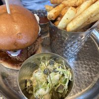 chick’n parmesan burger, caesar mayonnaise, guajillo pepper ketchup, pickles, caperberries, slaw, fries  at Mallow - Borough Market in South East London
