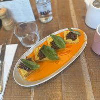 Delicious polenta-like tofu squared with basil in a red pepper sauce   at Mallow - Borough Market in South East London