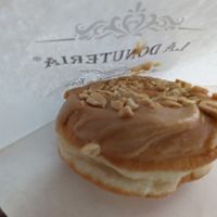 Slightly smashed peanut butter donut at La Donuteria - Spalena in Prague