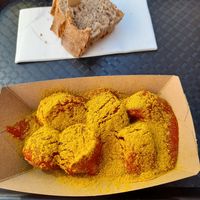 One portion of Currywurst with bread at MyCurrywurst  in Heidelberg