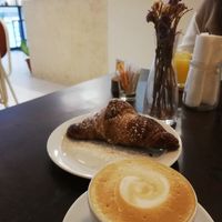 Cornetto ai frutti rossi e sambuco, cappuccino soia at VERA in Palermo