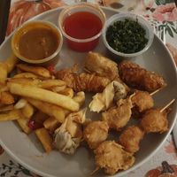 Wawin Special Combo: Crispy seaweed, crispy vegan wonton (2), vegan spring rolls (2), vegan chicken drumsticks (2), vegan chicken skewers in satay sauce (2), vegan prawn (2), serve at Wawin Vegan Chinese in Salford