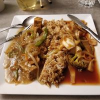 Tofu in garlic sauce on the left, mixed veg in ok sauce on the right with fried rice in the middle at Wawin Vegan Chinese in Salford