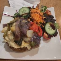 Jacket potato with humous and veg at World Peace Cafe in Leicester