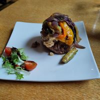 Jacket potato with houmous and Mediterranean veg at World Peace Cafe in Leicester