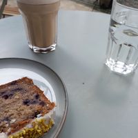 Blueberry cake and chai latte at Hono Coffee House in Grenoble