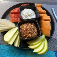 Seasonal fruits with yogurt and granola at Johannes Comfort Food and Bar in Merida
