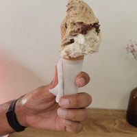Small cone with coffee and salted cashew ice cream at Imaginarni Zmrzlina in Prague