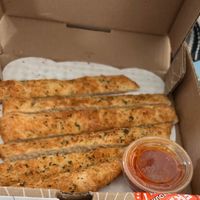 Vegan breadsticks. I already had some before this picture. They give a lot.  at Sarpino's Pizzeria in Coral Springs