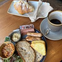 Vegan breakfast 8.45£, almond croissant 3.25£, Americano 3.40£  at kave in West London