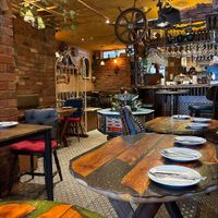 Gentle water fountain and lovely jazzy atmosphere   at Palmyra's Kitchen in North London