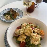 Bean chicken salad with side of pan fried hot vegetables  at Sunny Bowl in Seoul