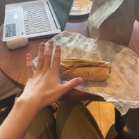 Falafel wrap with hand for size comparison   at Operation Falafel in Dubai