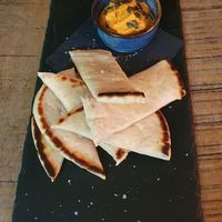CHEFS FLAVOURED HUMMUS Pitta, Toasted Seeds at The Bridge Hotel in Prestbury