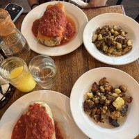 Breakfast burrito made vegan (bottom one) and a side of their potatoes   at Gillie's in Blacksburg