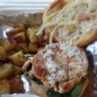 The vegan crabcake sandwich with potatoes at Gilleys. Delicious.  at Gillie's in Blacksburg