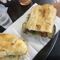Grilled veggies, hummus, dry tomatoes and chooped almonds sandwich  at Bono Bottega Nostrana in Rome