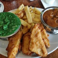Tofish and chips with curry and mushy peas at Papa's Fish & Chips in Blackpool