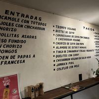 Wall menu en Español  at La Vegan Taqueria in Tulum