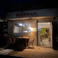 One outdoor table, 2 indoor tables, 3 barstools w/small ledge table  at La Vegan Taqueria in Tulum