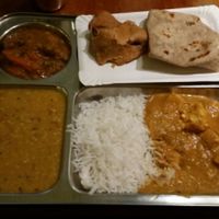 Clockwise from bottom right - masala paneer and rice, dhal, mixed veggie curry, samosa and chapatti. at Dhaba Beas - Vladislavova in Prague