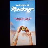 Drive thru welcome screen at Moonburger in Kingston