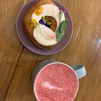 Rose latte with almond milk and doughnut   at Doe Bakehouse - City Centre in York