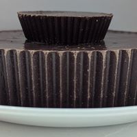 regular Nutpuck atop a giant Nutpuck at Chomp Chocolate in Salem