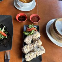 Vegan hot and sour soup and vegetable spring rolls in fried tofu   at LuLu Shanghai Delicacy & Sake Bar in North London