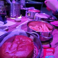 Quinoa burger with a side of fries (sans lid) at Rollercoaster in Vienna