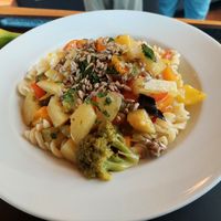 Pasta with summer vegetables in orange-herb sauce & caramelized sunflower seeds; free banana (9.90) at Paradieschen in Linsengericht