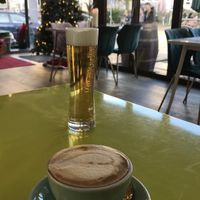 Oat milk cappuccino and a beer  at Heppy Green - City in Frankfurt