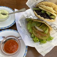Two different vegan arepas and the waiter insured me that the green sauce (and red) was also vegan. I felt a bit skeptical, but chose to trust him.   at Vene Canarias in Tenerife