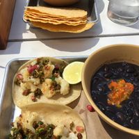 Cauliflower tacos, chips with fresh guacamole, side of black beans. at Bartaco in Boston