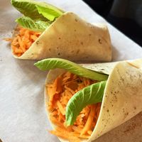 Roll with carrots, fried bell peppers, hummus and lettuce. at The Green Bean Cascade in Yerevan