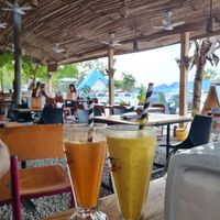 carrot juice + mango-passion smoothie at M&J Cafe  in Zanzibar